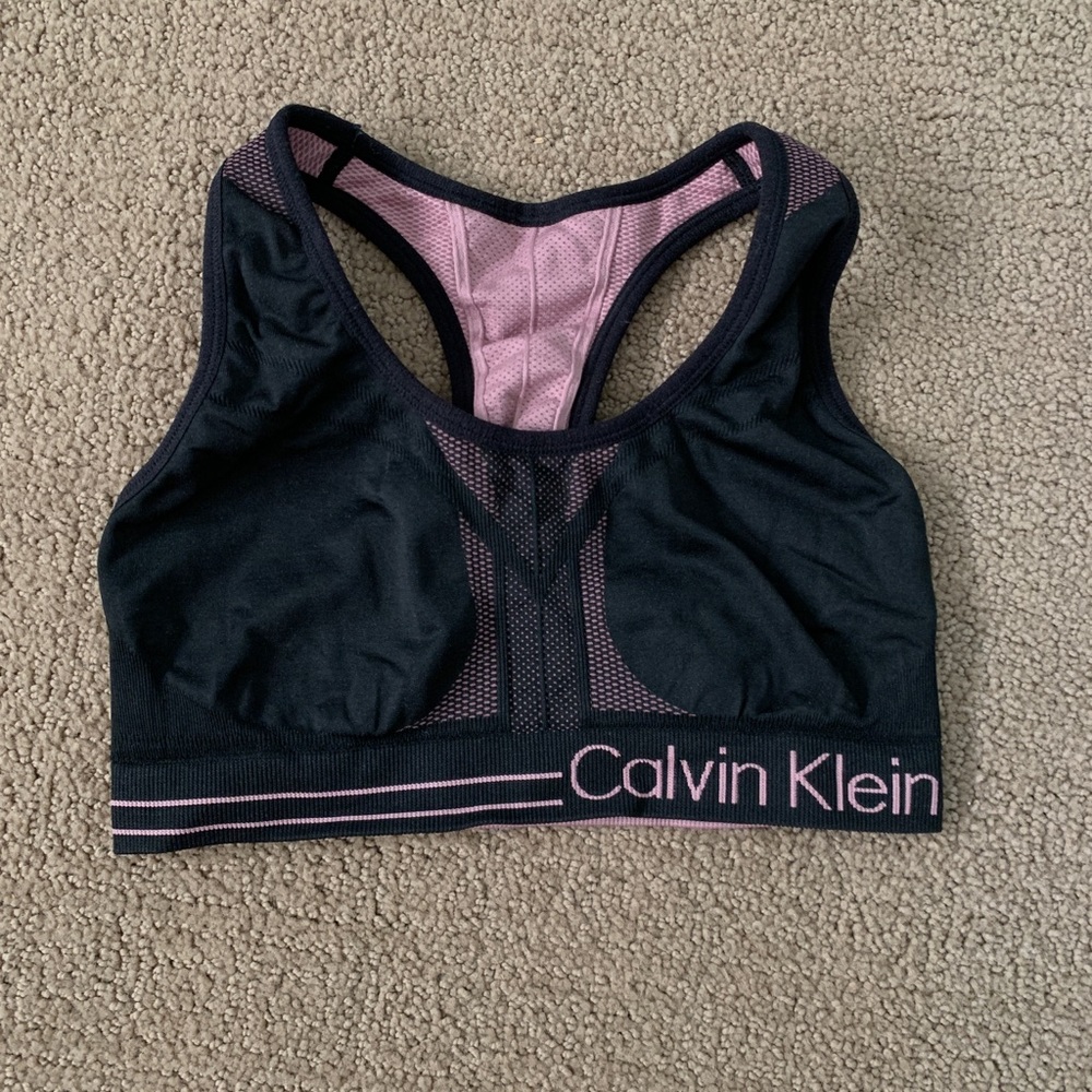 Pink and black reversible Calvin Klein sports bra